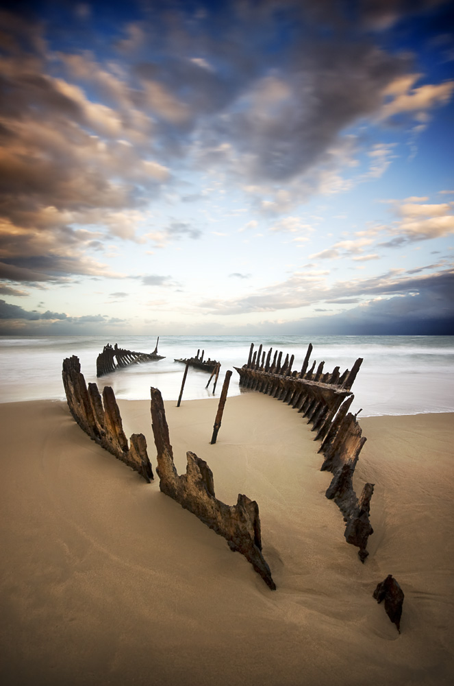 663x1000, 175 Kb / лодка, останки, песок, берег, небо, облака, вода, остов