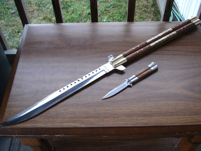 800x600, 126 Kb / нож, бабочка, стол