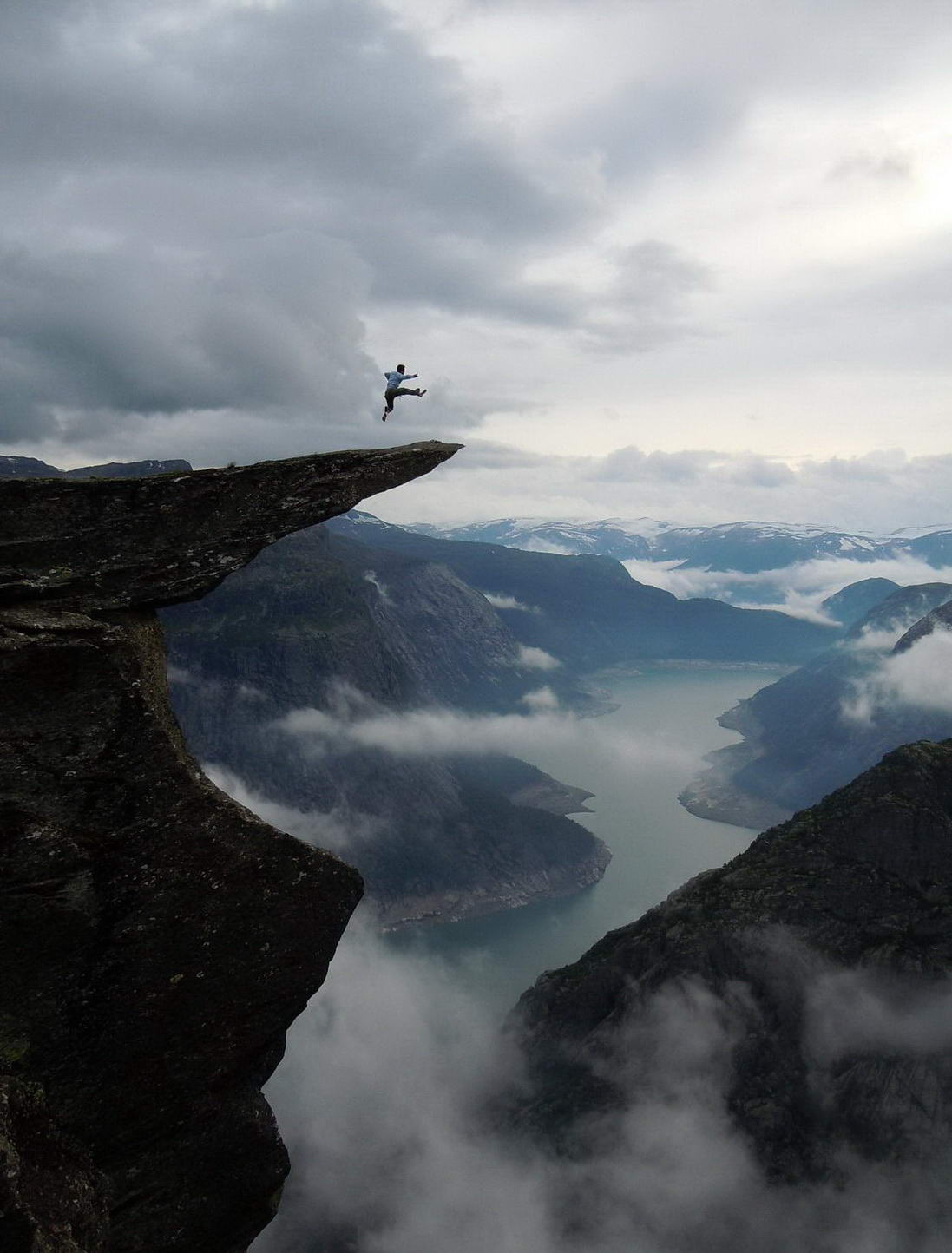 1097x1444, 119 Kb / облака, скала, человек